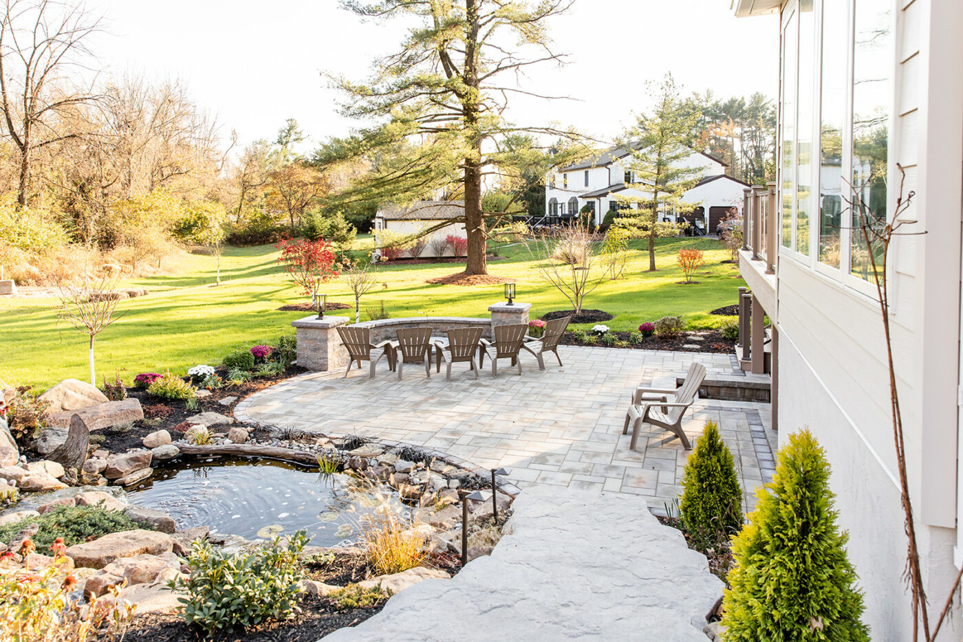 A backyard patio and rock garden hardscape installation in PA by Millstream Landscapes
