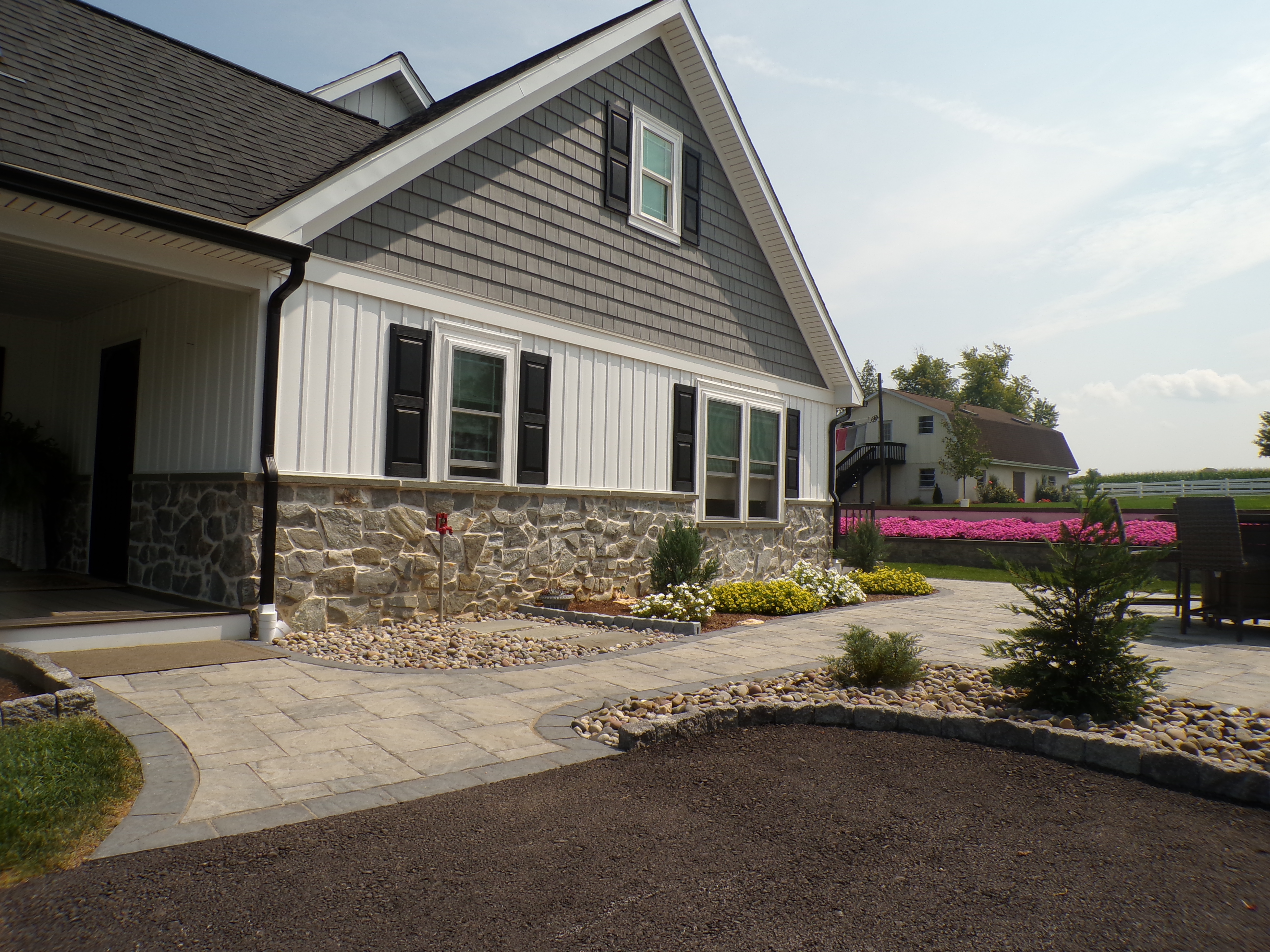 Custom Interconnected Patio with outdoor seating and rock gardens In Coatesville, PA 18 Custom Interconnected Patio with rock gardensfront In Coatesville PA