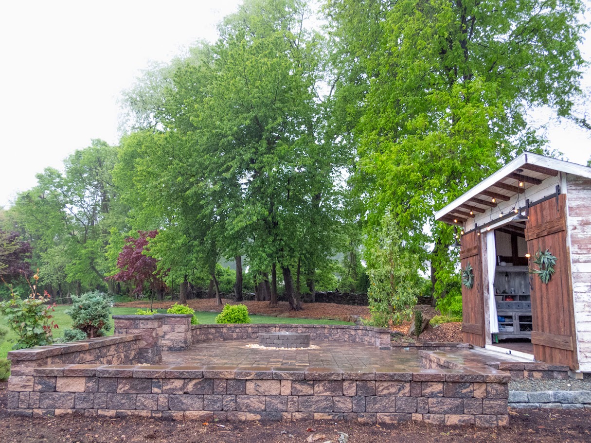 A Picturesque Paver Firepit and Patio Hardscape Installation 15 Luxscapes Paver Patio with Shed and Sitting walls