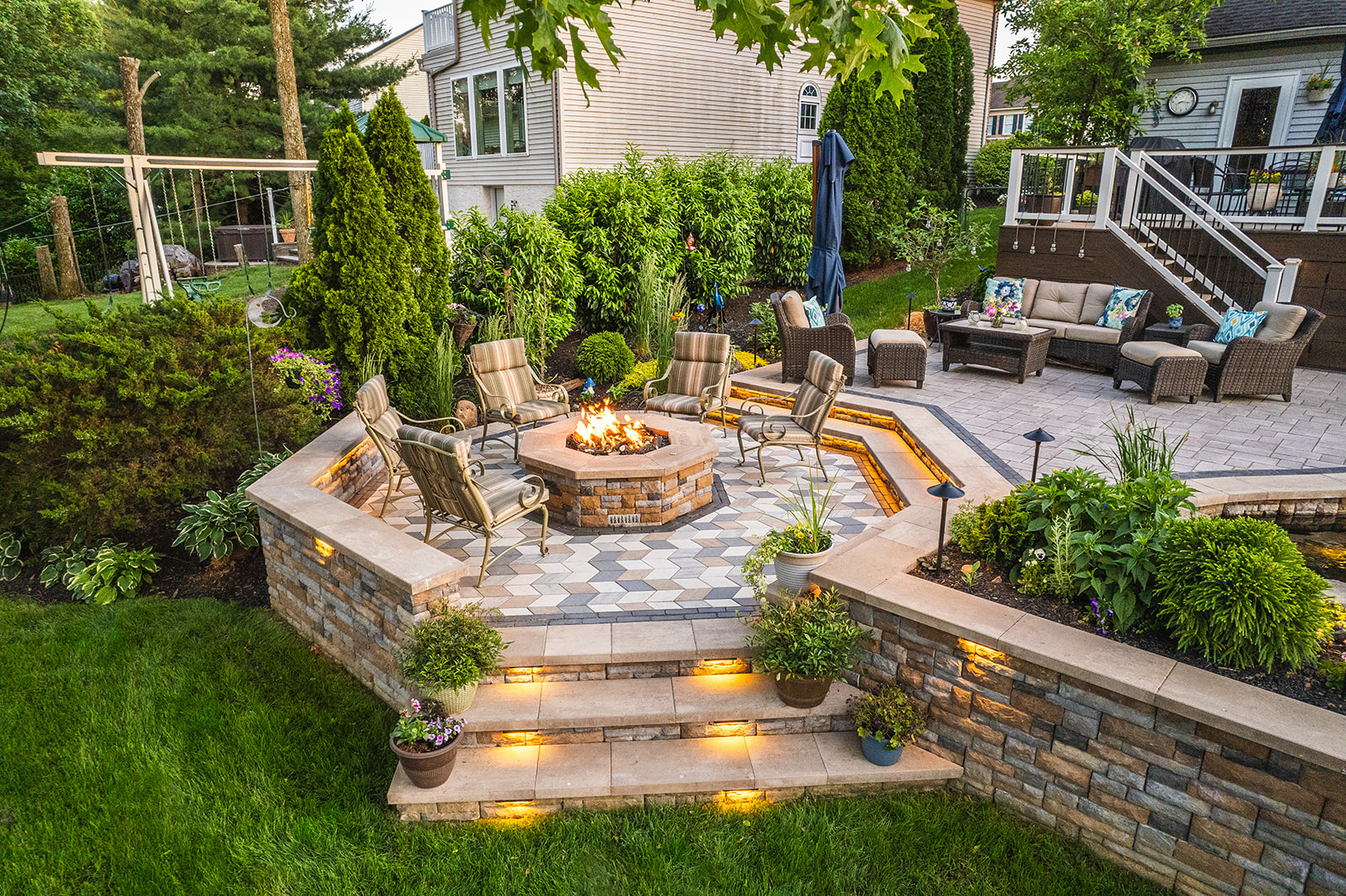 A Beautiful Backyard Patio Paradise Hardscape Installation 14 Retaining Wall Fire Pit Patio with Stone Step Hardscape Installation in Birdsboro PA
