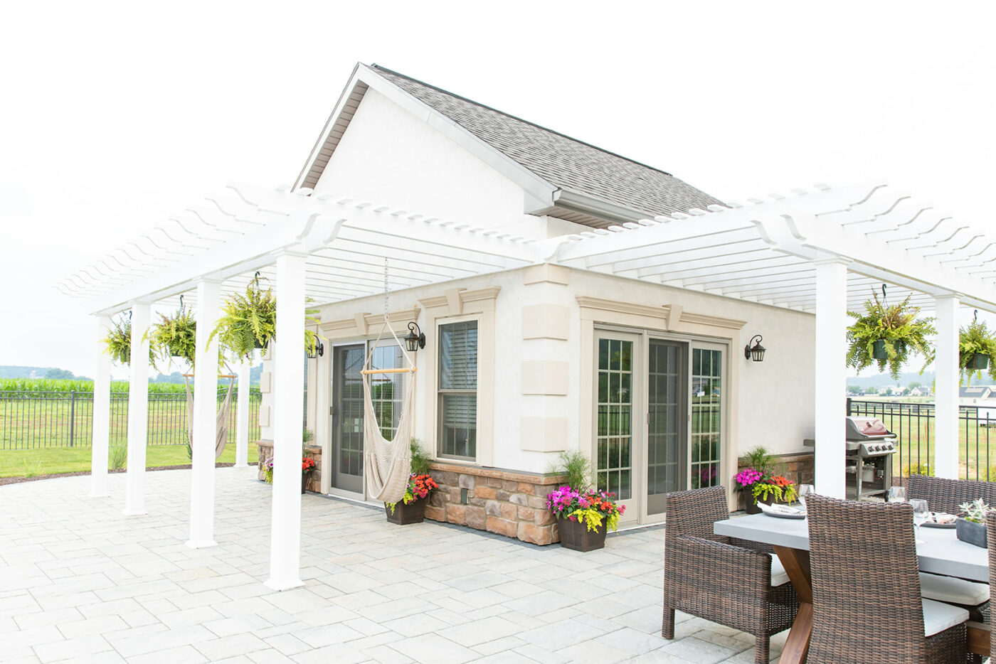 Swimming pool patio hardscape installation in PA by Millstream Landscape