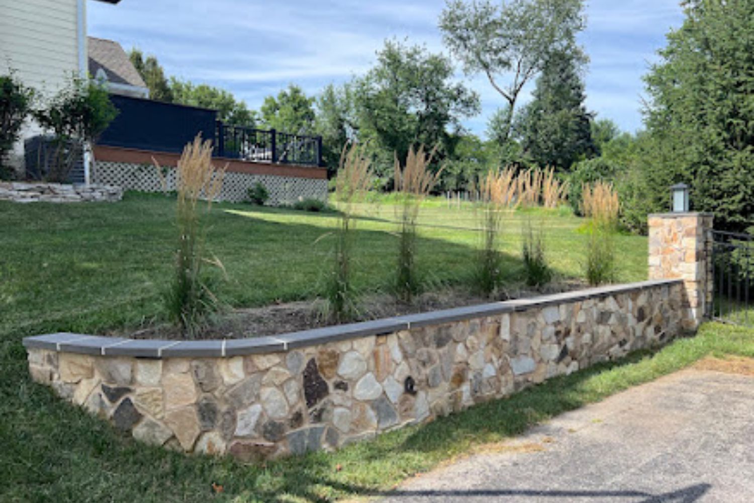 Custom Blend Retaining Wall & Walkway 5 granite pavers hardscape installation landscaping