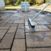 hydrobroom on pavers for jointing compound cleanup with xtreme easy product in the background