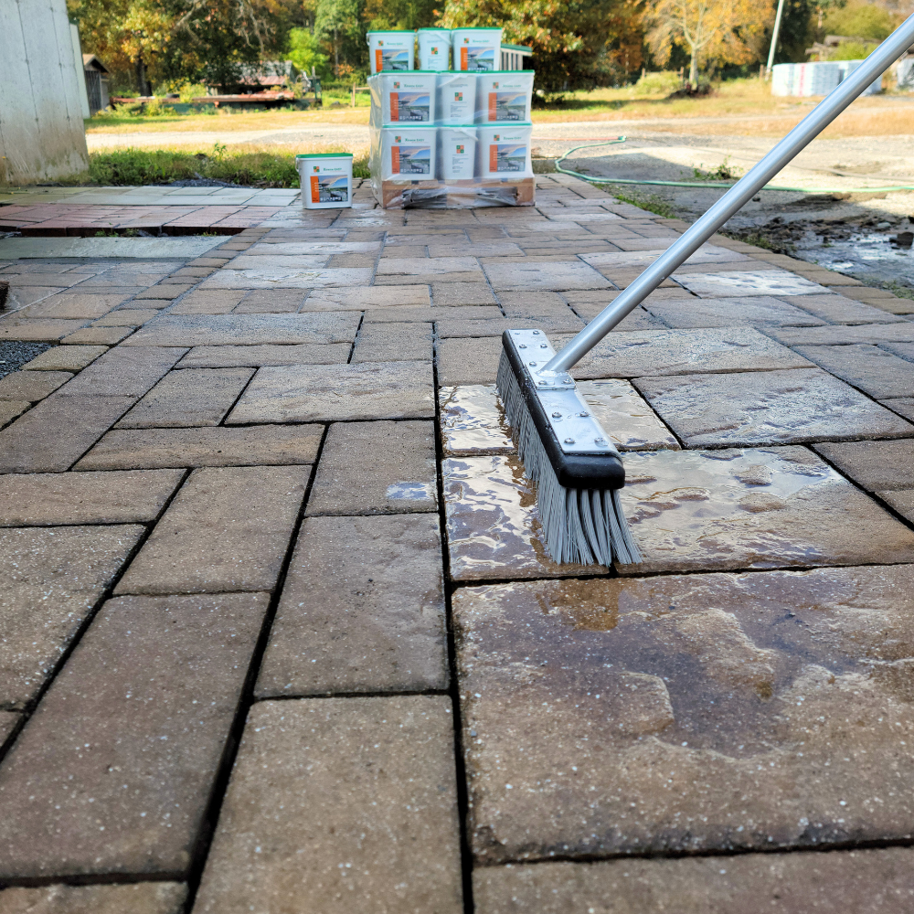 hydrobroom on pavers for jointing compound cleanup with xtreme easy product in the background