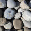 aerial closeup of new 2-4 inch england river rock for sale through Sauders