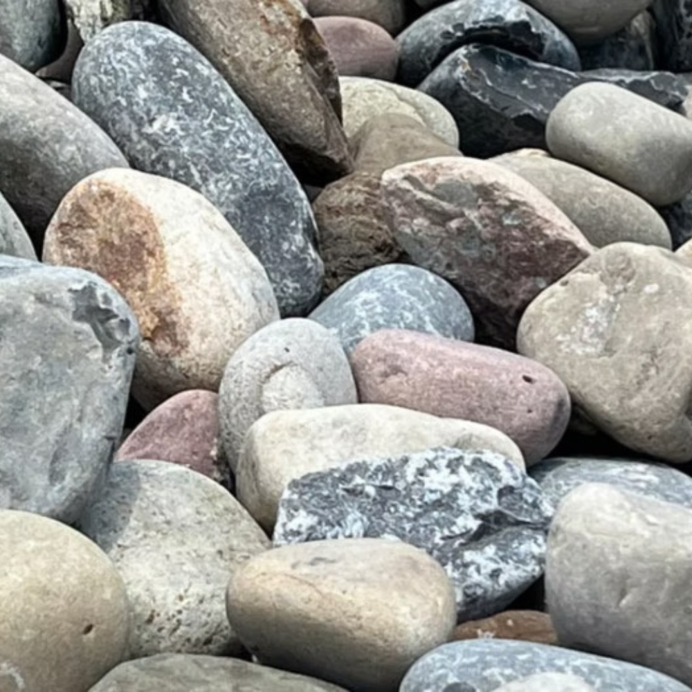 closeup of new 2-4 inch england river rock for sale through Sauders