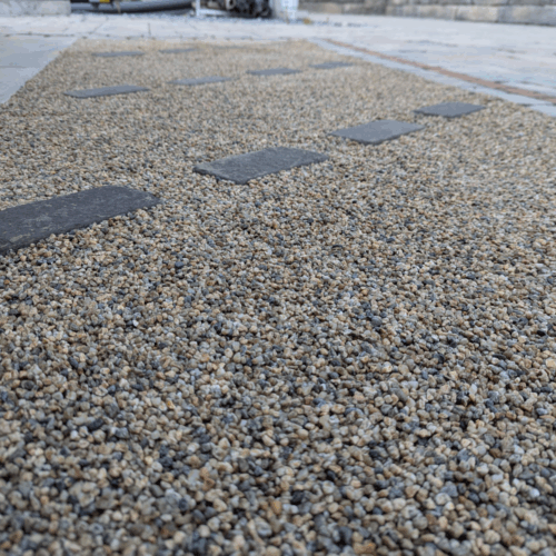 photo of a finished walkway with washed gravel earth color for sale
