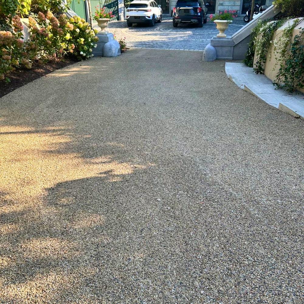 photo of a driveway with washed gravel earth color for sale